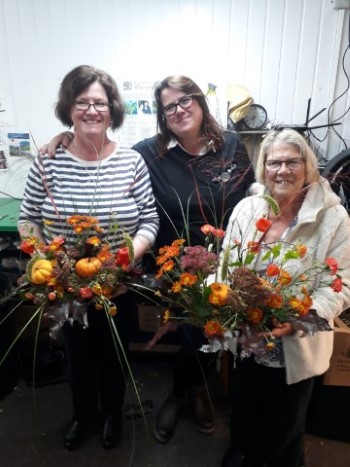 Class of 2019 demonstrating how to make an Autumn Waterfall Arrangement